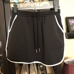 Cute black skirt!